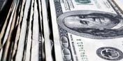 Dollar boost hits bullion – and the pound