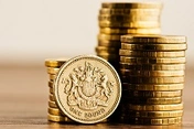 Sterling hits six-month low as BoE pause rate hikes