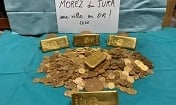 Gold bars and coins found stashed in old French house