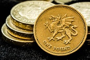 Rocky start for new PM as Pound his two-year low vs Dollar